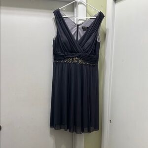 Chic Sleeveless Navy Dress with Embellished Waist